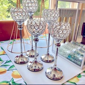10 silver stem, crystal candle holders and two white cube plant stands